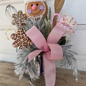 Festive Pink Holiday Arrangement with Gingerbread Accents